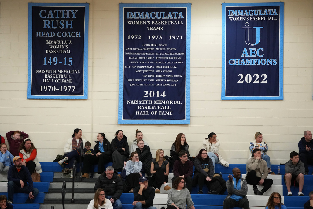 Fans watch an NCAA college basketball game between Immaculata and Marymount, Wednesday, Jan. 21, 2026, in Immaculata, Pa. (AP Photo/Matt Slocum)