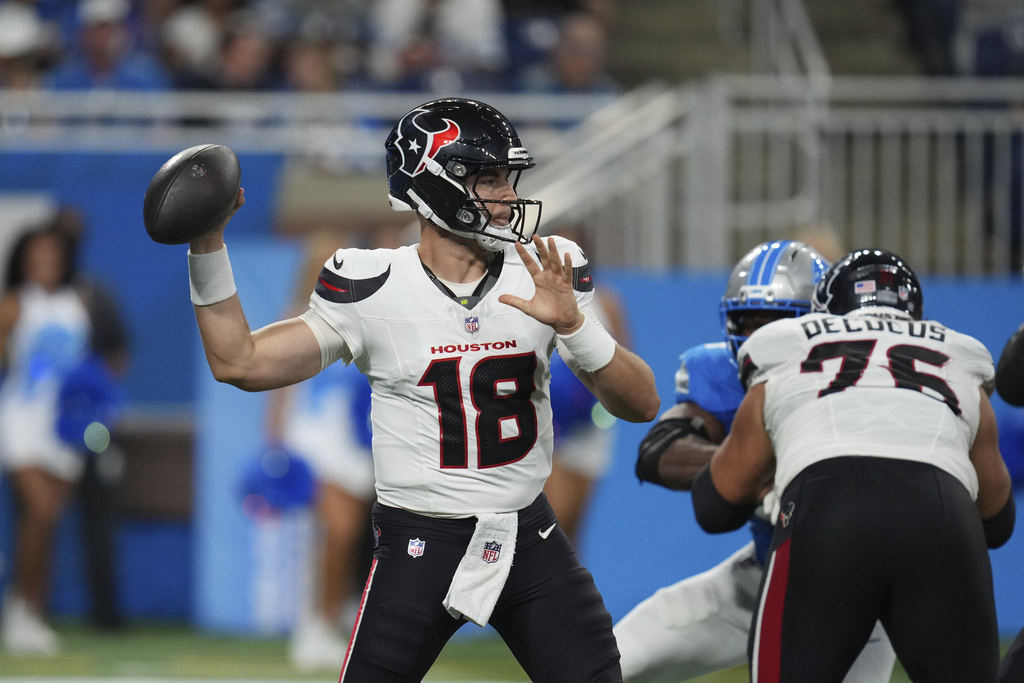 Houston Texans quarterback Graham Mertz (18) throws a pass against the Detroit Lions during the first half of a preseason NFL football game Saturday, Aug. 23, 2025, in Detroit. (AP Photo/Paul Sancya)