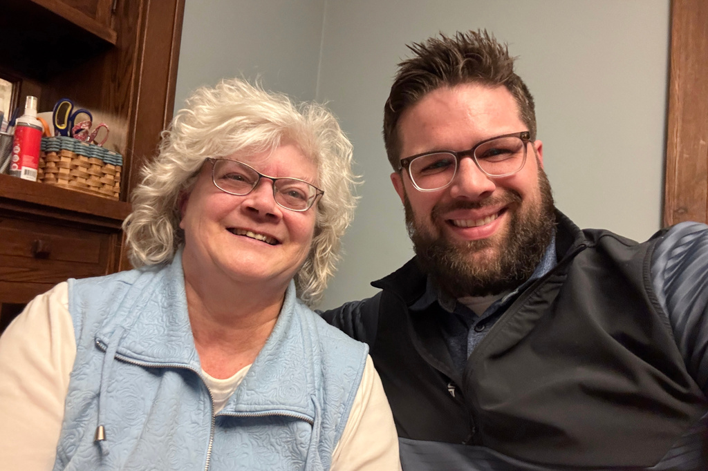 This photo provided by Kyle Bylin shows him with his biological mother, Liz O'Toole, April 4, 2025, in Minneapolis. (Kyle Bylin via AP)