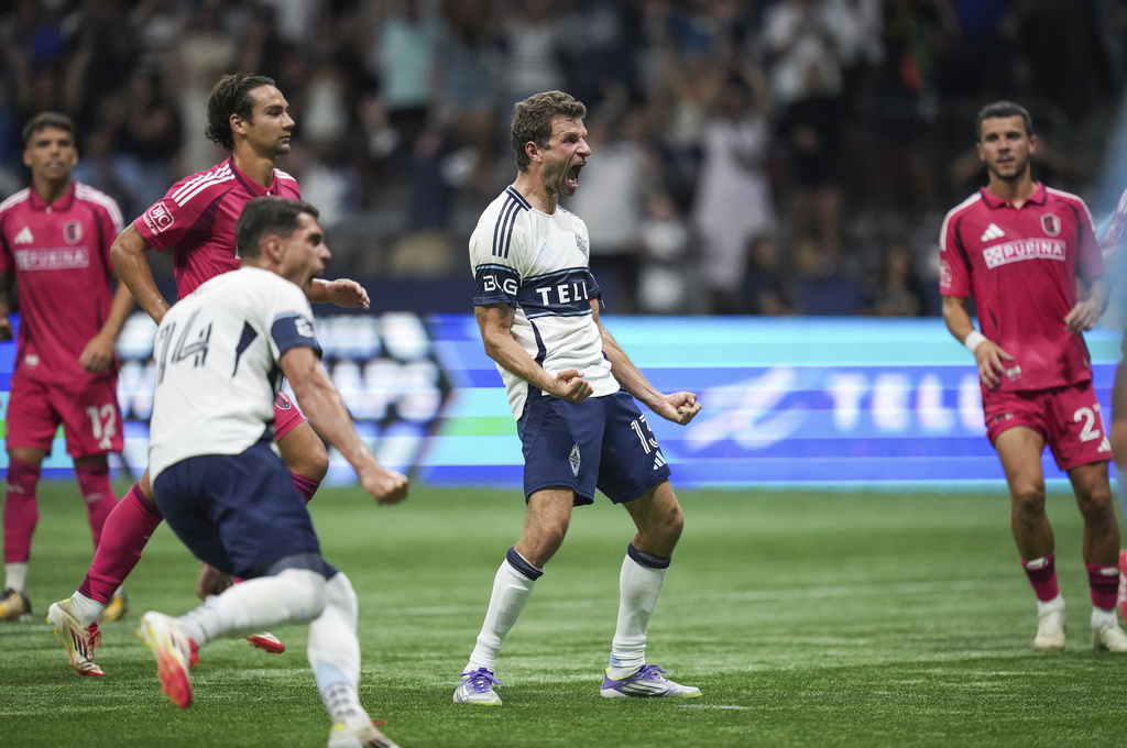 Vancouver Whitecaps Thomas Muller, centrer, celebrates his winning penalty kick goal against St. Louis City during the second half of an MLS soccer match, in Vancouver, British Columbia, Saturday, Aug. 23, 2025. (Darryl Dyck/The Canadian Press via AP)