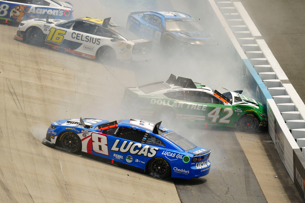 John Hunter Nemechek (42) and Kyle Busch (8) crash on the front stretch during the NASCAR All-Star auto race at Dover Motor Speedway, Sunday, May 17, 2026, in Dover, Del. (AP Photo/Derik Hamilton)