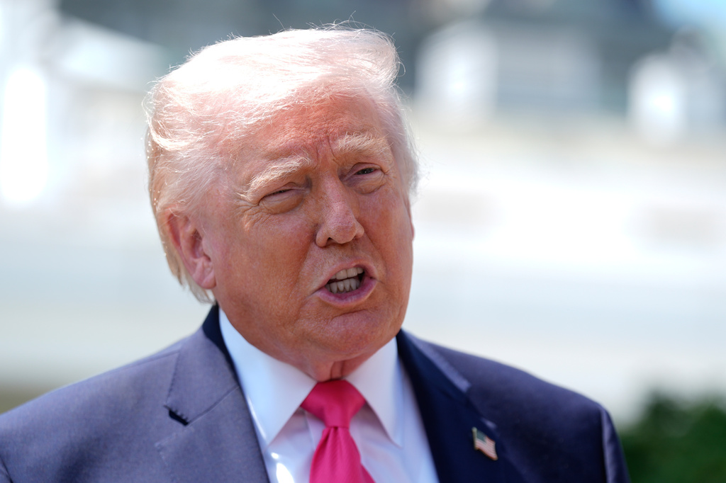President Donald Trump speaks with reporters before departing on Marine One from the South Lawn of the White House, Thursday, April 16, 2026, in Washington. (AP Photo/Manuel Balce Ceneta)