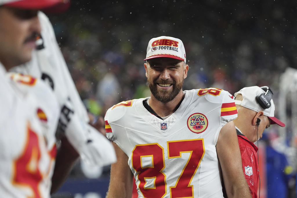Kansas City Chiefs tight end Travis Kelce (87) reacts on the sideline during the second half of an NFL preseason football game against the Seattle Seahawks, Friday, Aug. 15, 2025, in Seattle. (AP Photo/Lindsey Wasson)