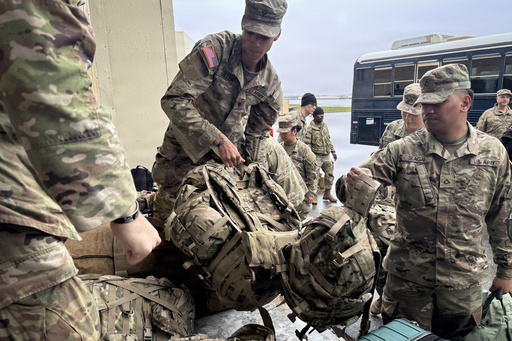 In this photo provided by Alaska National Guard, members of the Alaska National Guard prepare for departure from Joint Base Elmendorf-Richardson in Anchorage, Alaska, Monday, Oct. 13, 2025, during storm response operations after Typhoon Halong's landfall. (Capt. Balinda O'Neal/Alaska National Guard via AP) In this photo provided by Alaska National Guard, members of the Alaska National Guard prepare for departure from Joint Base Elmendorf-Richardson in Anchorage, Alaska, Monday, Oct. 13, 2025, during storm response operations after Typhoon Halong's landfall. (Capt. Balinda O'Neal/Alaska National Guard via AP)