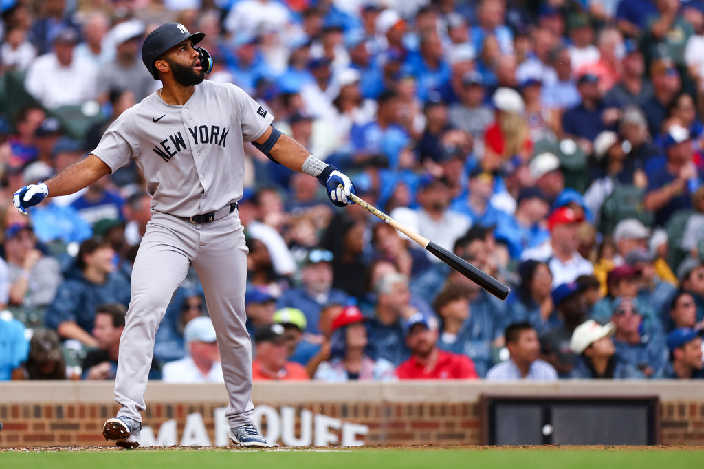 New York Yankees' Amed Rosario watches his home run during the fourth inning of a baseball game against the Chicago Cubs in Chicago, Friday, July 31, 2026. (AP Photo/Jessie Alcheh)