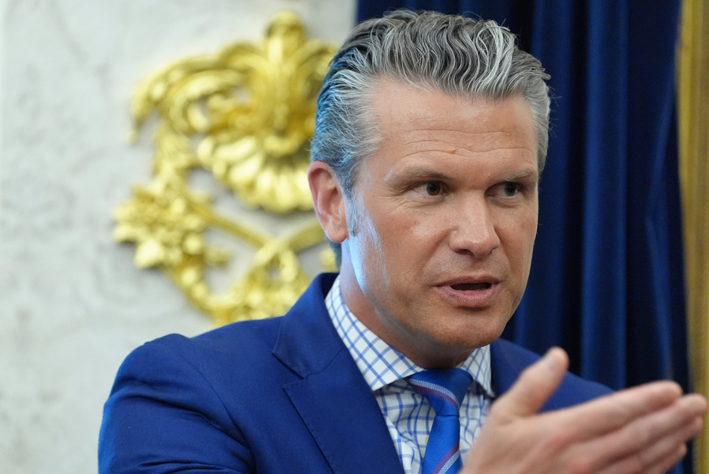 Defense Secretary Pete Hegseth speaks in the Oval Office of the White House during an executive order signing about quantum computing with President Donald Trump, Monday, June 22, 2026, in Washington. (AP Photo/Jacquelyn Martin)