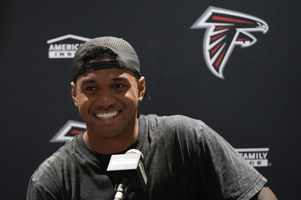 Atlanta Falcons quarterback Tua Tagovailoa speaks at a news conference after an NFL preseason football game against the Miami Dolphins, Friday, Aug. 28, 2026, in Miami Gardens, Fla. (AP Photo/Lynne Sladky)