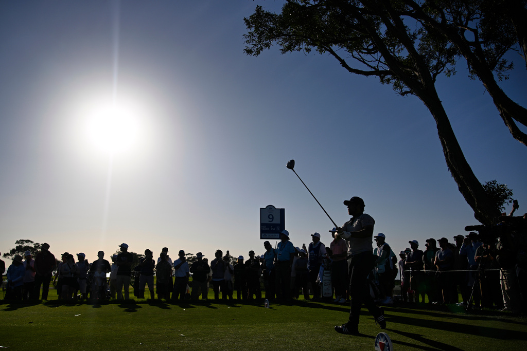 Xander Schauffele tees off on the ninth hole while playing the North Course at Torrey Pines during the second round of the Farmers Insurance Open golf tournament Friday, Jan. 30, 2026, in San Diego. (AP Photo/Denis Poroy)