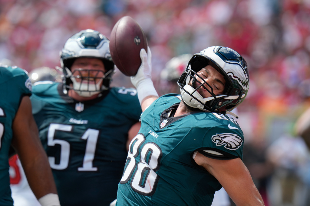 Philadelphia Eagles tight end Dallas Goedert (88) reacts after a touchdown during the first half of an NFL football game against the Tampa Bay Buccaneers, Sunday, Sept. 28, 2025, in Tampa, Fla. (AP Photo/Chris O'Meara)