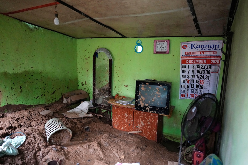 Mud fills the remains of a tea plantation worker's living quarters after a landslide at Craighead Estate in Nawalapitiya, Sri Lanka, Thursday, Dec. 11, 2025. (AP Photo/Eranga Jayawardena)