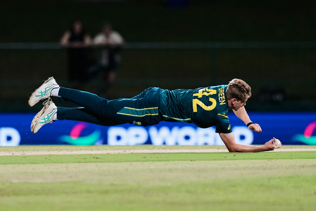 Australia's Cameron Green fields the ball during the T20 World Cup cricket match between Australia and Oman in Pallekele, Sri Lanka, Friday, Feb. 20, 2026. (AP Photo/Eranga Jayawardena)