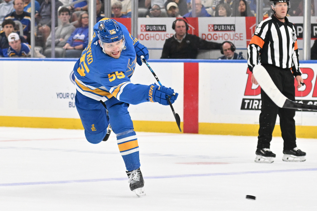St. Louis Blues defenseman Colton Parayko shoots the puck against the Pittsburgh Penguins during the second period of an NHL hockey game Tuesday, April 14, 2026, in St. Louis. (AP Photo/Jeff Le)