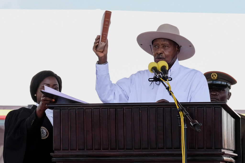 Uganda's long-time president Yoweri Museveni, 81, takes an oath of office during the inauguration ceremony for a seventh consecutive five-year term, in Kampala, Uganda, Tuesday, May 12, 2026. (AP Photo/Hajarah Nalwadda )
