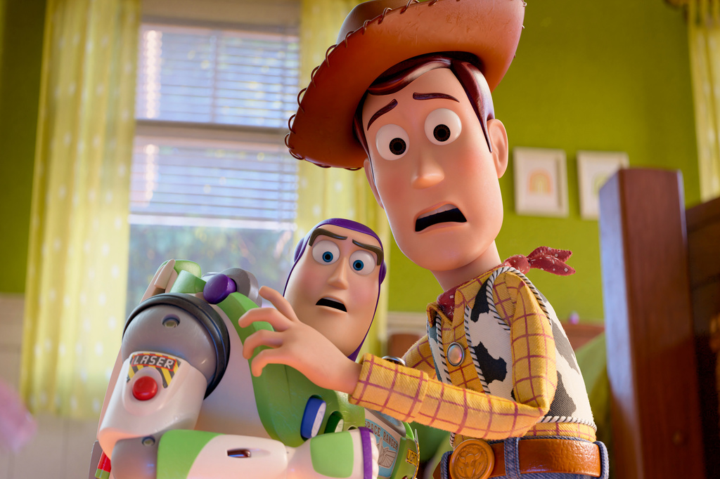 This image released by Disney shows characters Buzz Lightyear, voiced by Tim Allen, left, and Woody, voiced by Tom Hanks, in a scene from "Toy Story 5." (Pixar-Disney via AP)