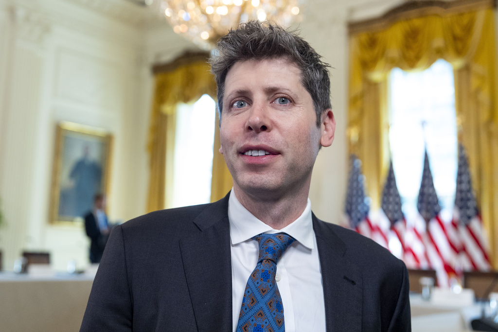 Sam Altman, CEO of OpenAI, takes his seat before a meeting of the White House Task Force on Artificial Intelligence Education in the East Room of the White House, Thursday, Sept. 4, 2025, in Washington. (AP Photo/Alex Brandon)