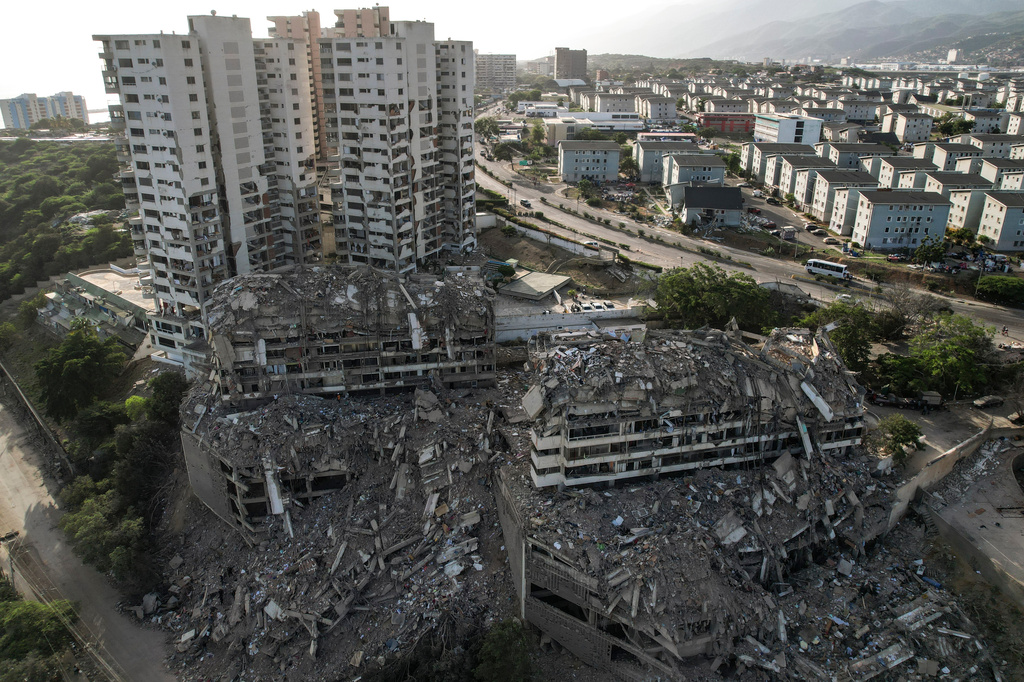 Buildings damaged by the earthquakes stand three days after earthquakes struck Catia La Mar, Venezuela, Saturday, June 27, 2026. (AP Photo/Matias Delacroix)