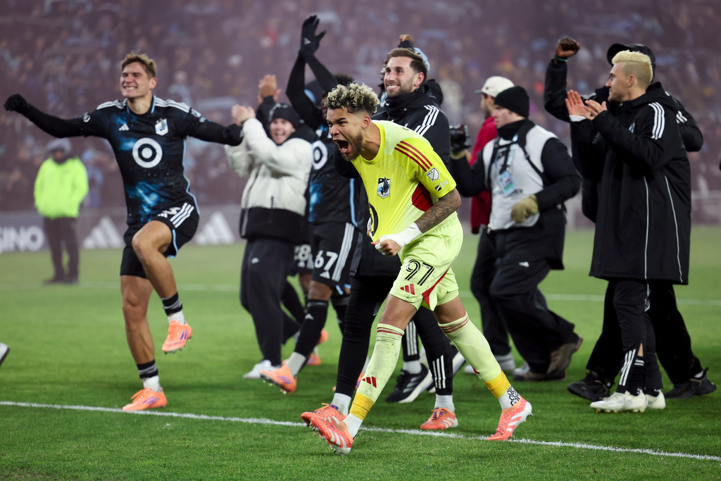 Minnesota United goalkeeper Dayne St. Clair (97) celebrates after his team won Game 3 in the first round of MLS soccer's Western Conference playoffs against the Seattle Sounders in St. Paul, Minn., Saturday, Nov. 8, 2025. (AP Photo/Ellen Schmidt)