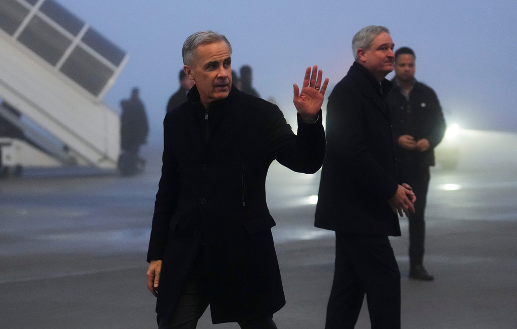 Canada Prime Minister Mark Carney departs Zurich, Switzerland on Wednesday, Jan. 21, 2026, after attending the annual World Economic Forum in Davos. (Sean Kilpatrick/The Canadian Press via AP)