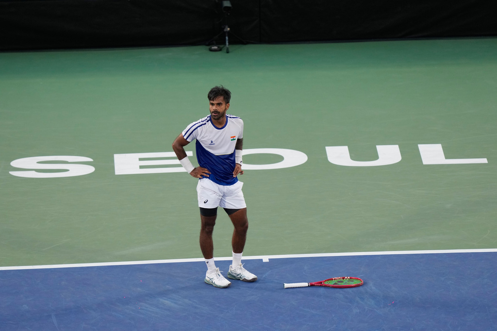 India's Sumit Nagal stands after missing a point against South Korea's Hyeon Chung during a Davis Cup second round qualifier tennis match between South Korea and India, in Seoul, South Korea, Friday, Sept. 18, 2026. (AP Photo/Ahn Young-joon)