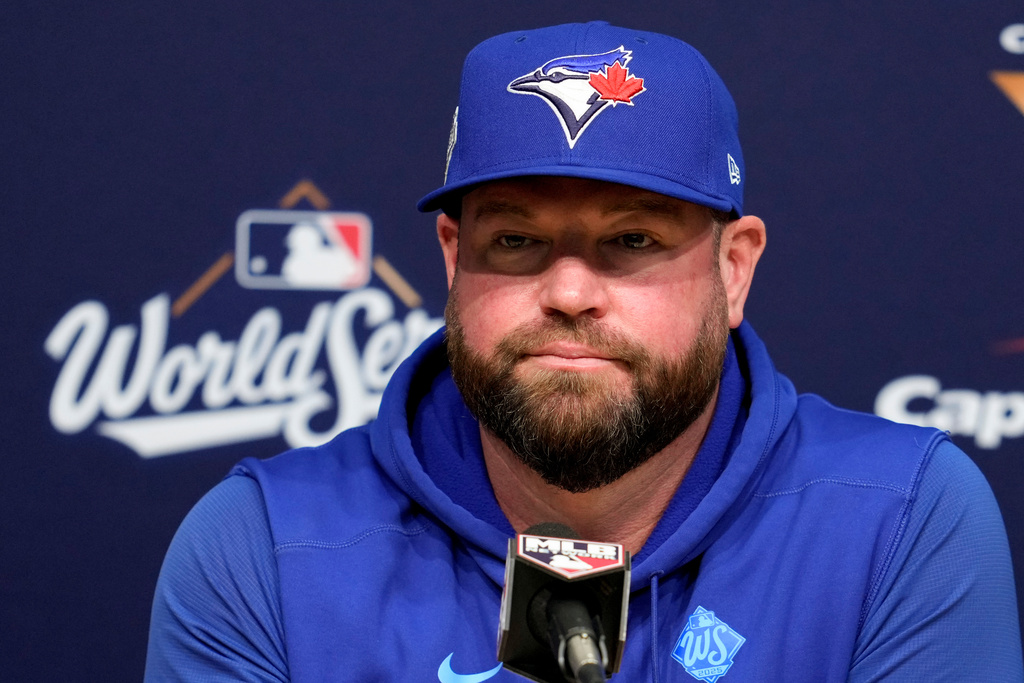 Toronto Blue Jays manager John Schneider speaks prior to Game 4 of baseball's World Series against the Los Angeles Dodgers, Tuesday, Oct. 28, 2025, in Los Angeles. (AP Photo/Ashley Landis)