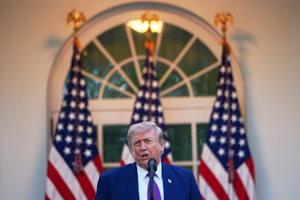 President Donald Trump speaks at a dinner for members of his administration and law enforcement organization leaders, during National Police Week, in the White House Rose Garden, Monday, May 11, 2026, in Washington. (AP Photo/Julia Demaree Nikhinson)