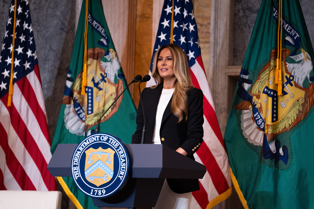 First lady Melania Trump speaks about Trump Accounts for children in foster care at the Department of Treasury, Thursday, June 11, 2026, in Washington. (AP Photo/Allison Robbert)