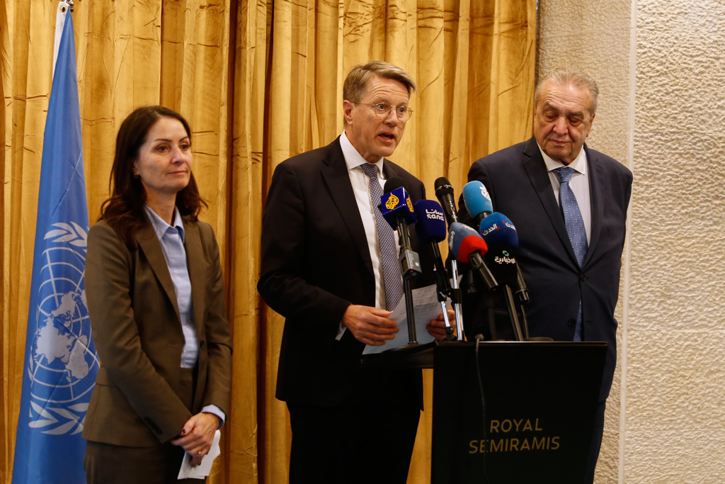 Samuel Zbogar, center, Slovenia's permanent representative to the United Nations and president of the Security Council, delivers a statement in Damascus, Syria, Thursday, Dec. 4, 2025. (AP Photo/Omar Sanadiki)