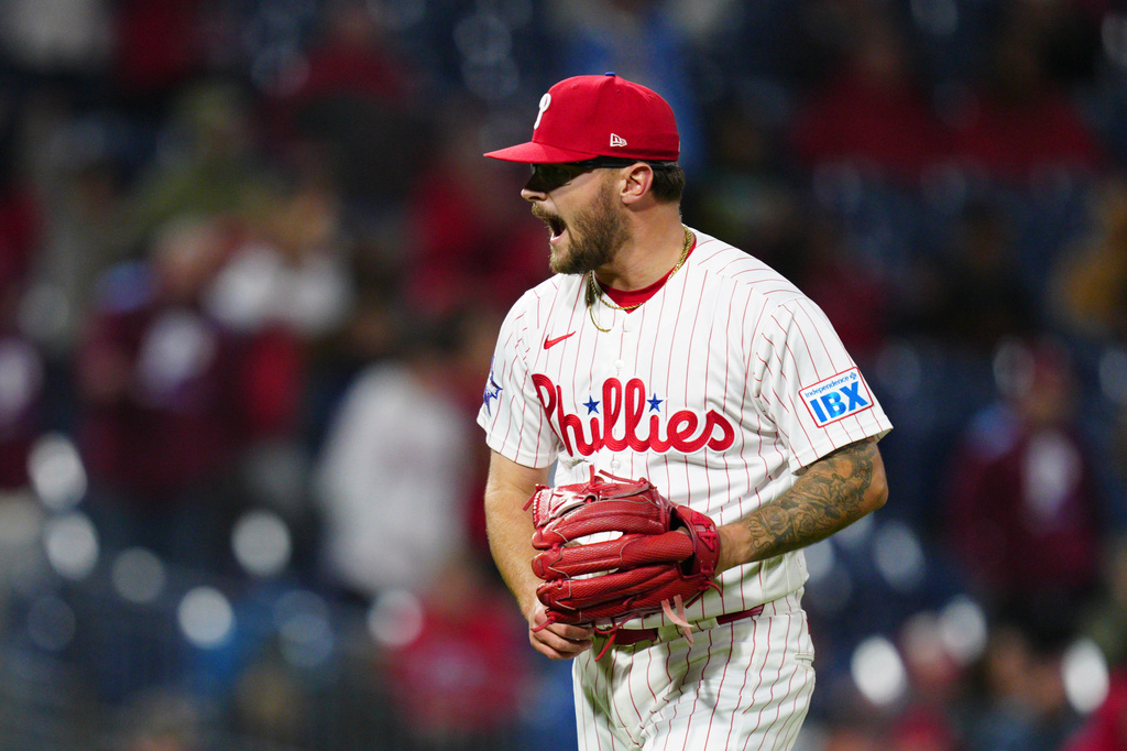 Philadelphia Phillies pitcher Chase Shugart reacts after a fly out by San Francisco Giants' Casey Schmitt during the 10th inning of the second baseball game of a doubleheader, Thursday, April 30, 2026, in Philadelphia. (AP Photo/Derik Hamilton)