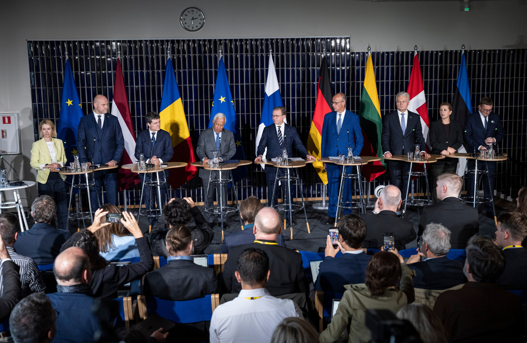 Rear from left, the High Representative of the Union for Foreign Affairs, Security Policy Kaja Kallas, Prime Minister of Latvia Andris Kulbergs, President of Romania Nicușor Dan, President of the European Council Antonio Costa, Prime Minister Petteri Orpo of Finland, German Chancellor Friedrich Merz, President of Lithuania Gitanas Nauseda, Prime Minister Mette Frederiksen of Denmark and Prime Minister of Estonia Kristen Michal attend a press conference as part of the European Arctic Summit in Rovaniemi, Finland, Monday, Sept. 14, 2026. (Jouni Porsanger/Lehtikuva via AP)