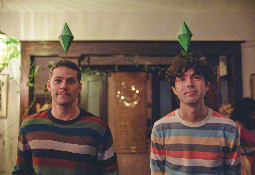 This image released by Roadside Attractions shows Dylan O'Brien, left, and James Sweeney in a scene from "Twinless." (Roadside Attractions via AP)