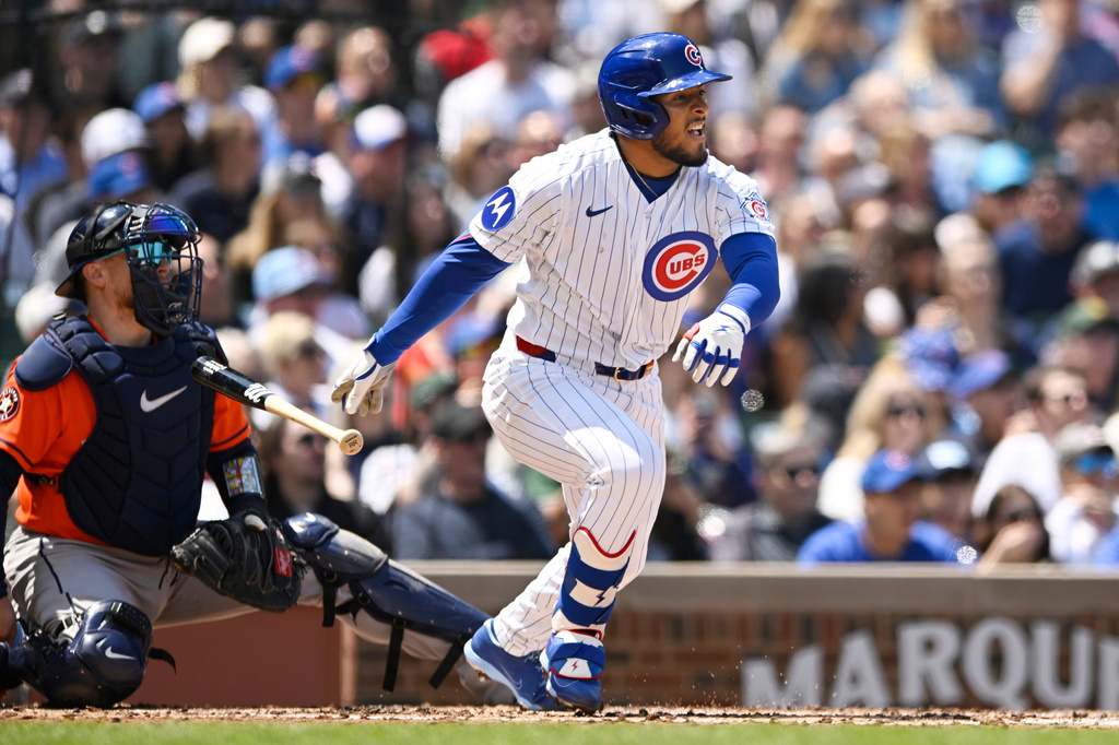 Chicago Cubs' Pedro Ramirez, right, watches his RBI double during the second inning of a baseball game against the Houston Astros in Chicago, Sunday, May 24, 2026. (AP Photo/Paul Beaty)