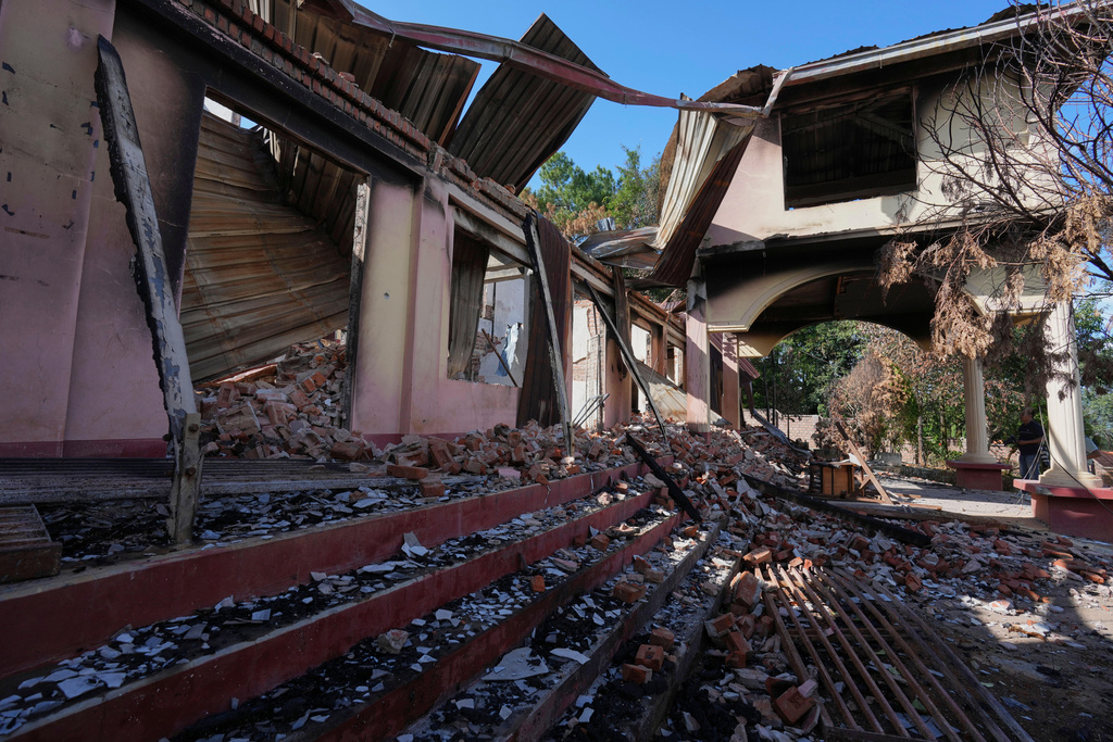In this photo taken during a trip supervised by pro-military Myanmar media, a damaged court is seen in Kyaukme, northern Shan State, Myanmar, Friday, Oct. 10, 2025. (AP Photo/Aung Shine Oo)