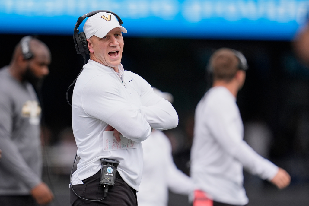 Vanderbilt head coach Clark Lea yells to on official during the first half of an NCAA college football game against Utah State, Saturday, Sept. 27, 2025, in Nashville, Tenn. (AP Photo/George Walker IV)