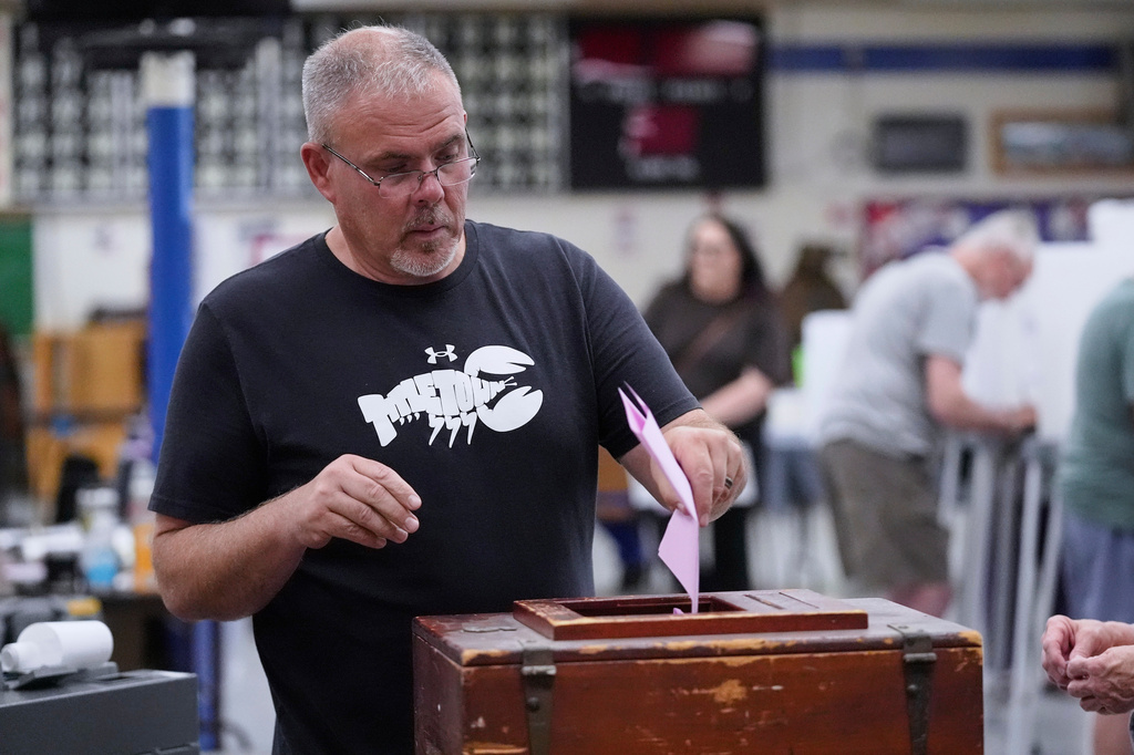 Art Fairbrother casts one of his ballots while voting in the Maine Primary, Tuesday, June 9, 2026, in Belfast, Maine. (AP Photo/Robert F. Bukaty)
