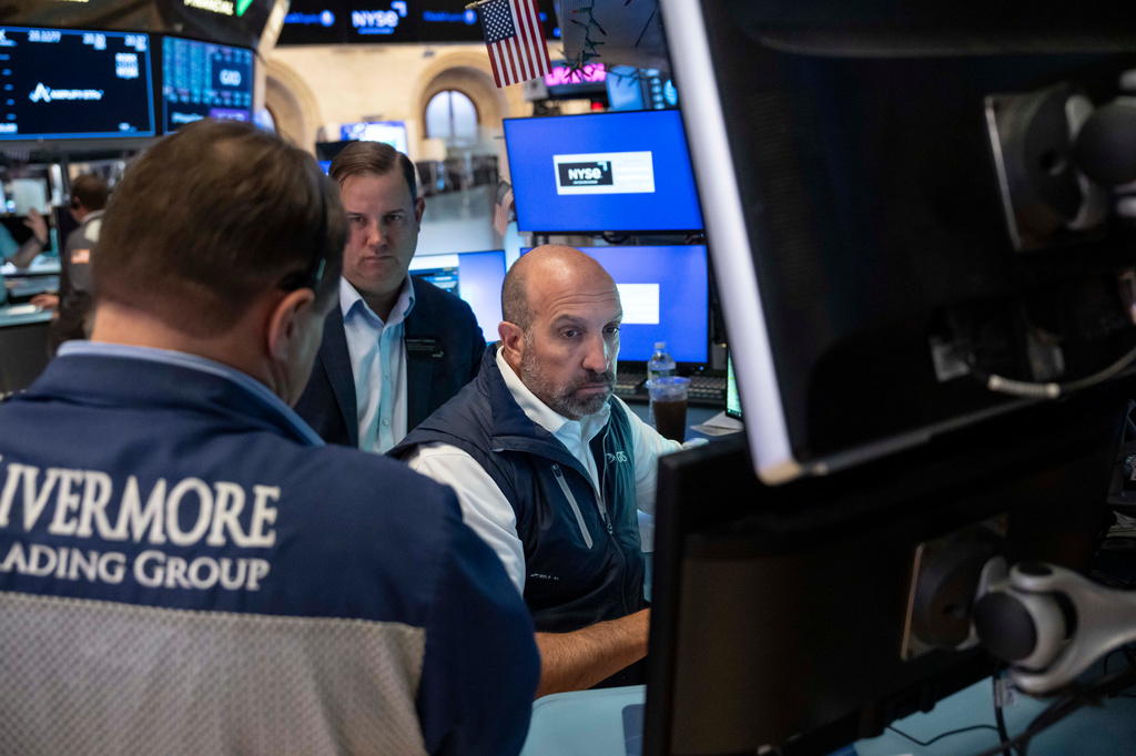 Specialist James Denaro works on the floor of the New York Stock Exchange, Thursday, Aug. 27, 2026, in New York. (AP Photo/Yuki Iwamura)