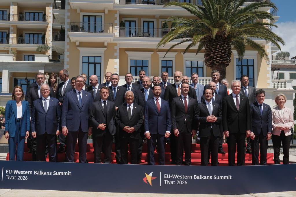EU leaders and officials from the candidate countries pose for the family photo of the EU-Western Balkans summit in the Montenegrin coastal town of Tivat, Friday, June 5, 2026. (AP Photo/Risto Bozovic)