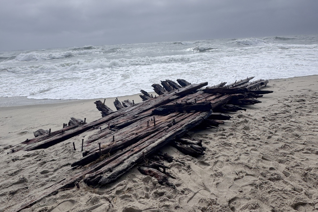 Shipwreck remains exposed by a powerful nor'easter are seen along the southern shore of Nantucket, Mass on Sunday, Sept. 27, 2026. (Hayley Nelson/Egan Maritime Institute via AP)