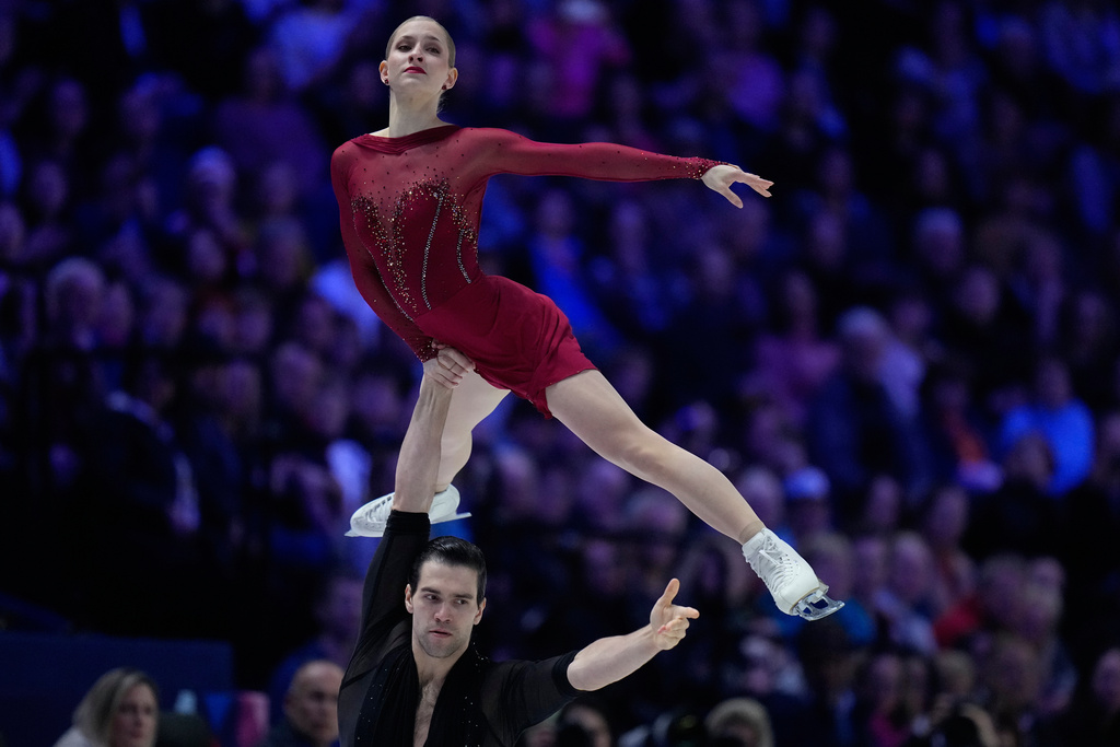 Minerva Fabienne Hase and Nikita Volodin from Germany perform during the pairs short program at the Figure Skating World Championships in Prague, Czech Republic, Wednesday, March 25, 2026. (AP Photo/Petr David Josek)