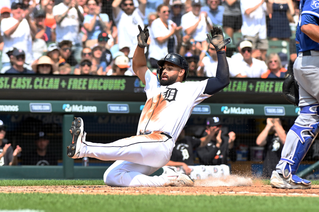 Detroit Tigers' Riley Greene slides and scores during the fifth inning of a baseball game against the Kansas City Royals, Sunday, July 26, 2026, in Detroit. (AP Photo/Jose Juarez)