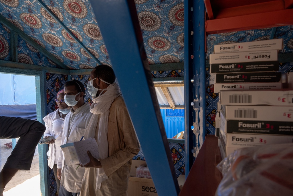 Doctors pick up medicine in the pharmacy of the Douankaran health clinic in the Hodh El Chargui Region, Mauritania, Nov. 7, 2025. (AP Photo/Caitlin Kelly)