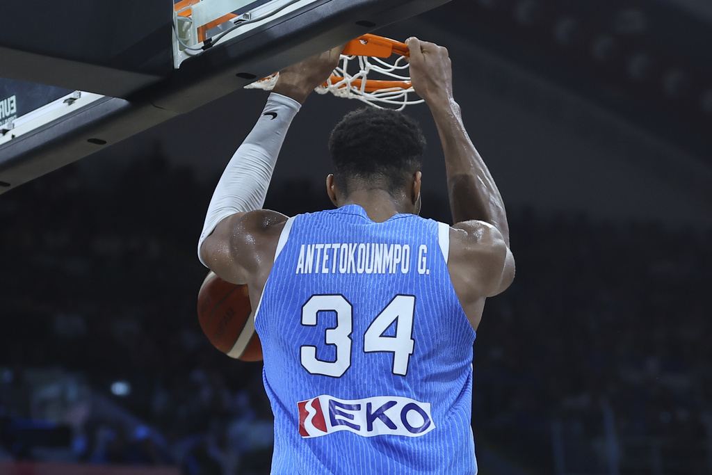 Greece's Giannis Antetokounmpo dunks the ball during the Eurobasket, European Basketball Championship Group C match between Spain and Greece at Spyros Kyprianou Arena, in Limassol, Cyprus, Thursday, Sept. 4, 2025. (AP Photo/Sakis Savvides)