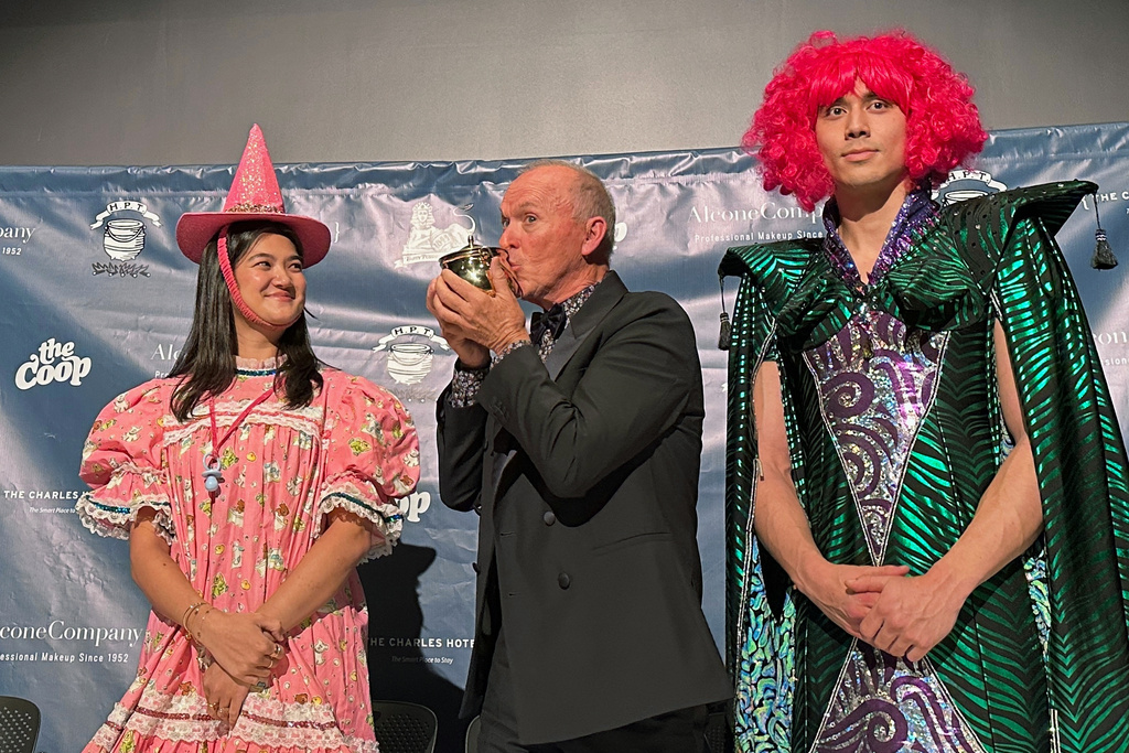 CORRECTS THE PHOTOGRAPHER'S NAME TO MICHAEL CASEY - Actor Michael Keaton participates in a roast at Harvard University's annual Hasty Pudding Theatricals Man of the Year award show at Farkas Hall, Friday, Feb. 6, 2026, in Cambridge, Mass. (AP Photo/Michael Casey)