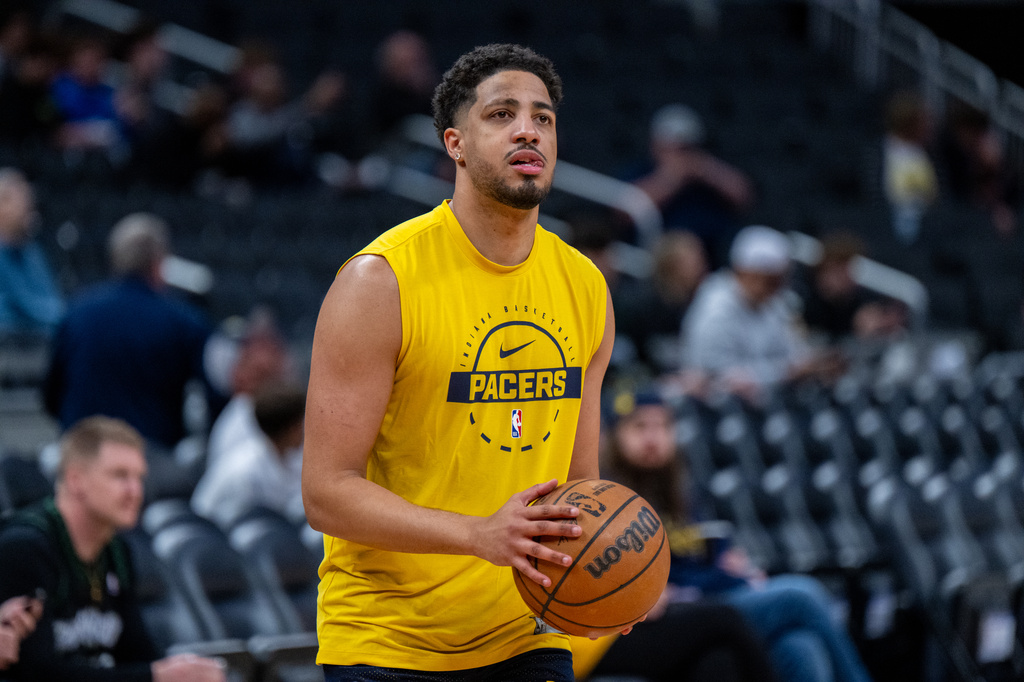 Indiana Pacers guard Tyrese Haliburton (0) shoots around on the court before an NBA basketball game against the Minnesota Timberwolves in Indianapolis, Tuesday, April 7, 2026. (AP Photo/Doug McSchooler)