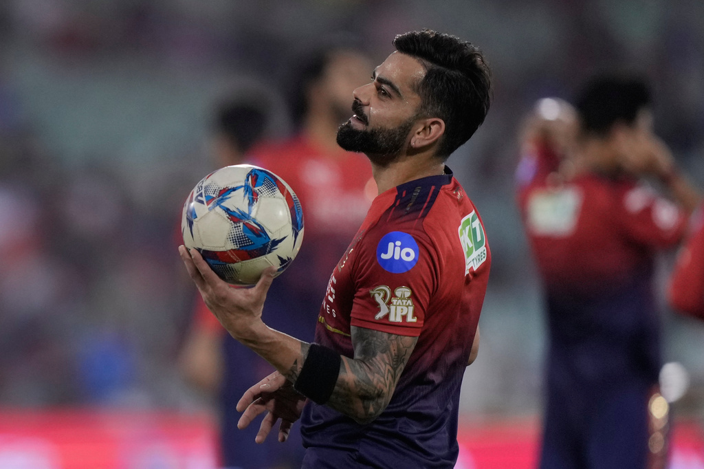 Royal Challengers Bengaluru's Virat Kohli warm ups before the start of the Indian Premier League cricket match between Royal Challengers Bengaluru and Mumbai Indians in Raipur, India, Sunday, May 10, 2026. (AP Photo/Mahesh Kumar A.)