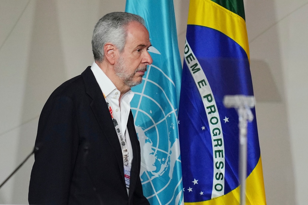 André Corrêa do Lago, COP30 president, arrives back into a plenary session at the COP30 U.N. Climate Summit, Saturday, Nov. 22, 2025, in Belem, Brazil. (AP Photo/Andre Penner)