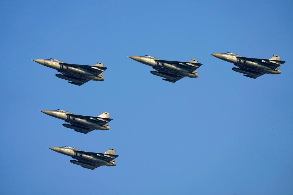 FILE -Indian Air Force fighter jets MIG-21 fly past during Air Force Day celebrations at Sangam, the holy confluence of river Ganga, Yamuna and the mythical Saraswati, in Prayagraj, India, Oct. 8, 2023. (AP Photo/Rajesh Kumar Singh, File)