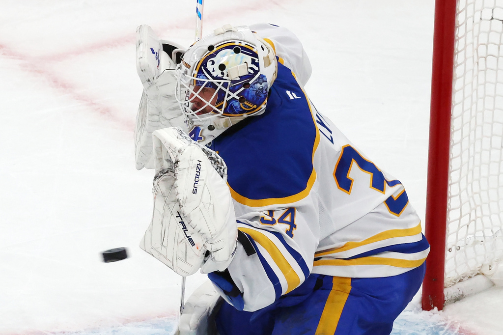 Buffalo Sabres' Alex Lyon makes a save during the third period in Game 4 of a first-round NHL hockey Stanley Cup playoff series against the Boston Bruins, Sunday, April 26, 2026, in Boston. (AP Photo/Michael Dwyer)