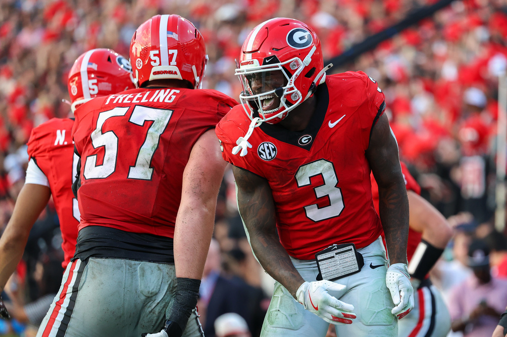 FILE - Georgia running back Nate Frazier (3) reacts after scoring a touchdown during the second half of an NCAA college football game against Mississippi, Oct. 18, 2025, in Athens, Ga. (AP Photo/Colin Hubbard, File)