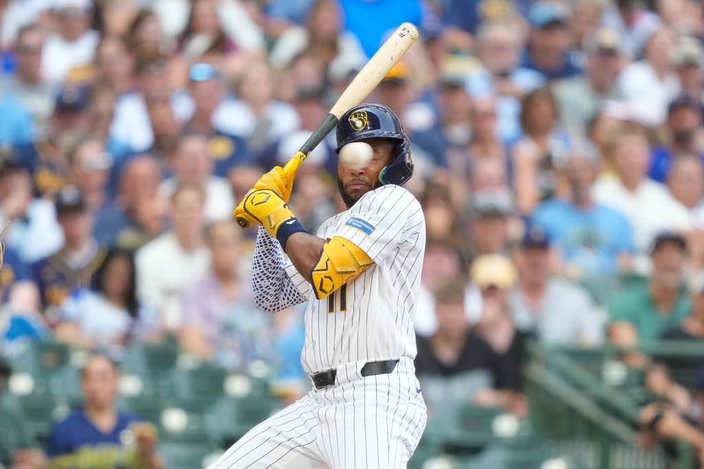 Milwaukee Brewers' Jackson Chourio reacts to a high and inside pitch during the first inning of a baseball game against the Miami Marlins Saturday, July 18, 2026, in Milwaukee. (AP Photo/Kayla Wolf)