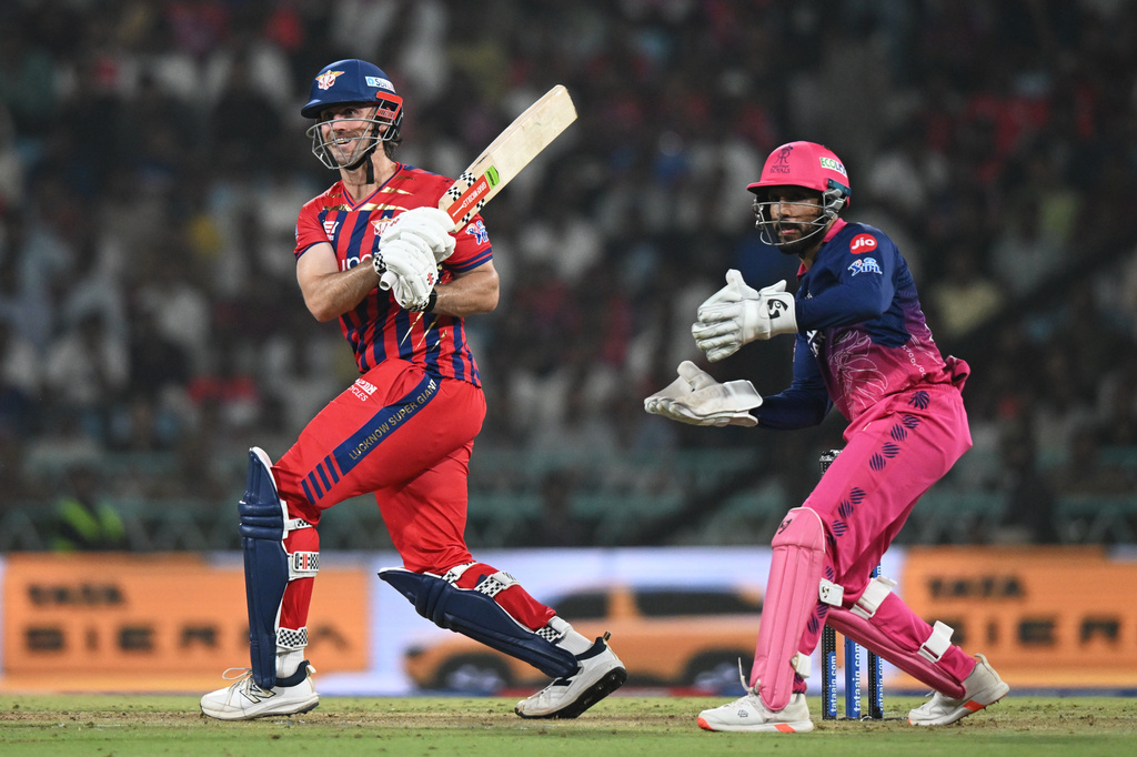 Lucknow Super Giants' Mitchell Marsh plays a shot during the Indian Premier League cricket match between Lucknow Super Giants and Rajasthan Royals in Lucknow, India, Wednesday, April 22, 2026. (AP Photo)